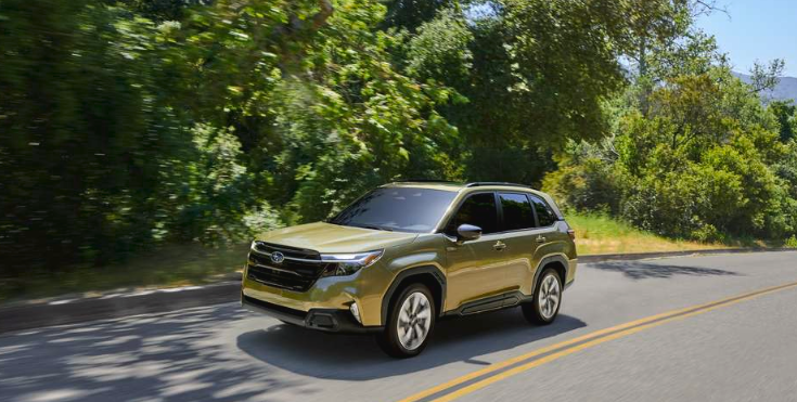 Exterior front 3/4 action major of the Forester Hybrid in Autumn Green Metallic