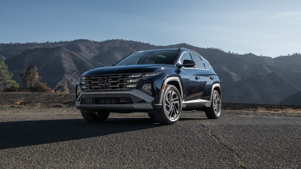 Front side hero view of a parked 2026 Hyundai Tucson Hybrid.