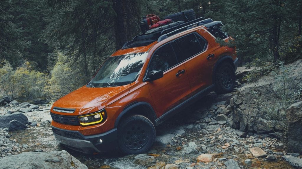 Orange 2026 Honda Passport TrailSport off-road driving