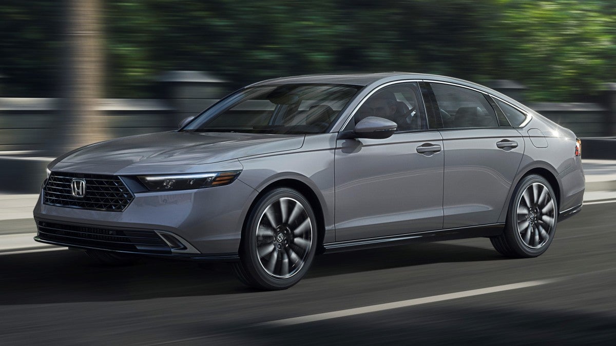 2025 Honda Accord Touring Side Hero View Driving on City street
