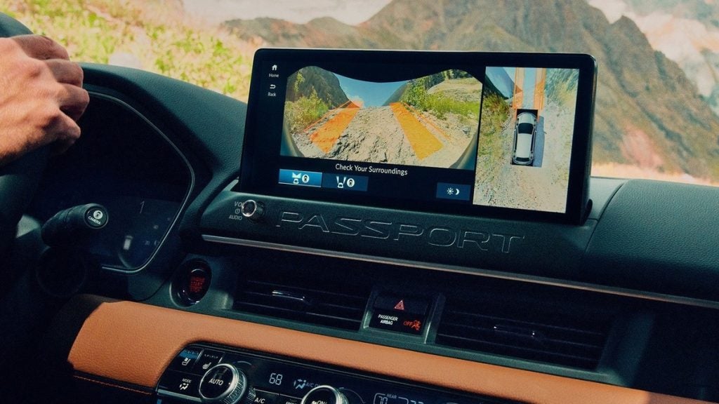 2026 Honda Passport TrailSport Elite shown with Brown Interior.