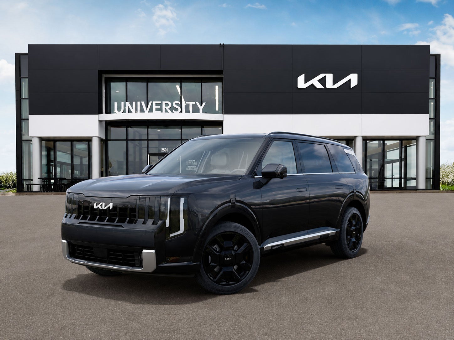 Modern Kia hybrid SUV outside University Kia Waco dealership