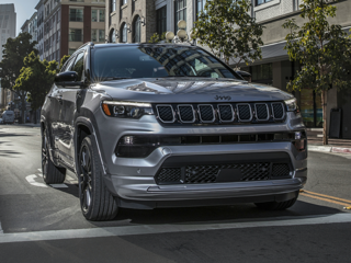 A gray Jeep Compass on the road