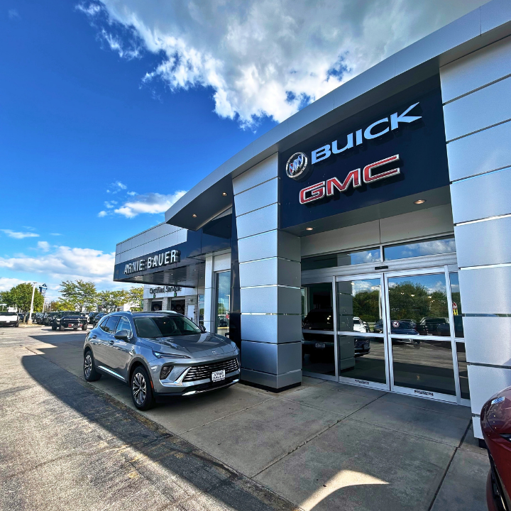 The physical Arnie Bauer Buick GMC dealership building and parts department in Matteson, IL, highlighting a local one-stop shop alternative to online-only car vending machines.