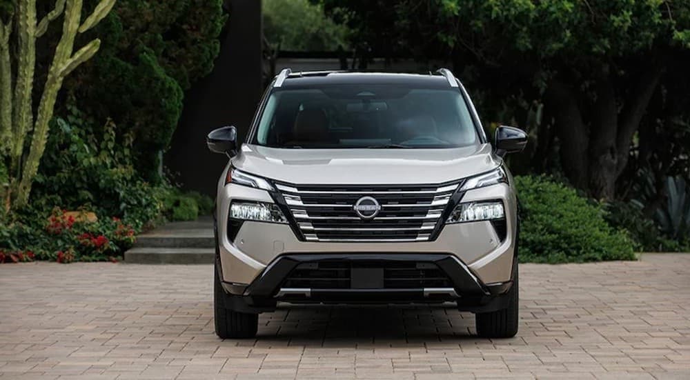 A white 2026 Nissan Rogue parked in a parking area.