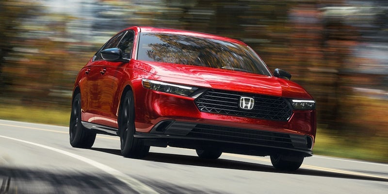 A red 2024 Honda Accord Hybrid.