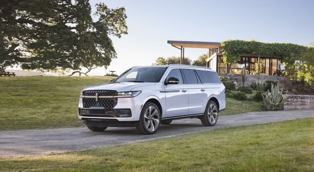 A white 2025 Lincoln Navigator from the front at an angle.