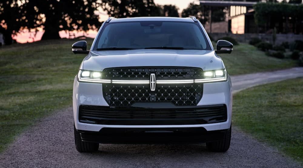 A white 2027 Lincoln Navigator parked on a road.
