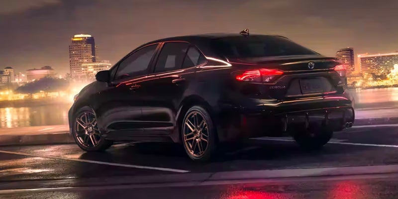 A 2024 Toyota Corolla at night with glowing lights near Bishop, CA 