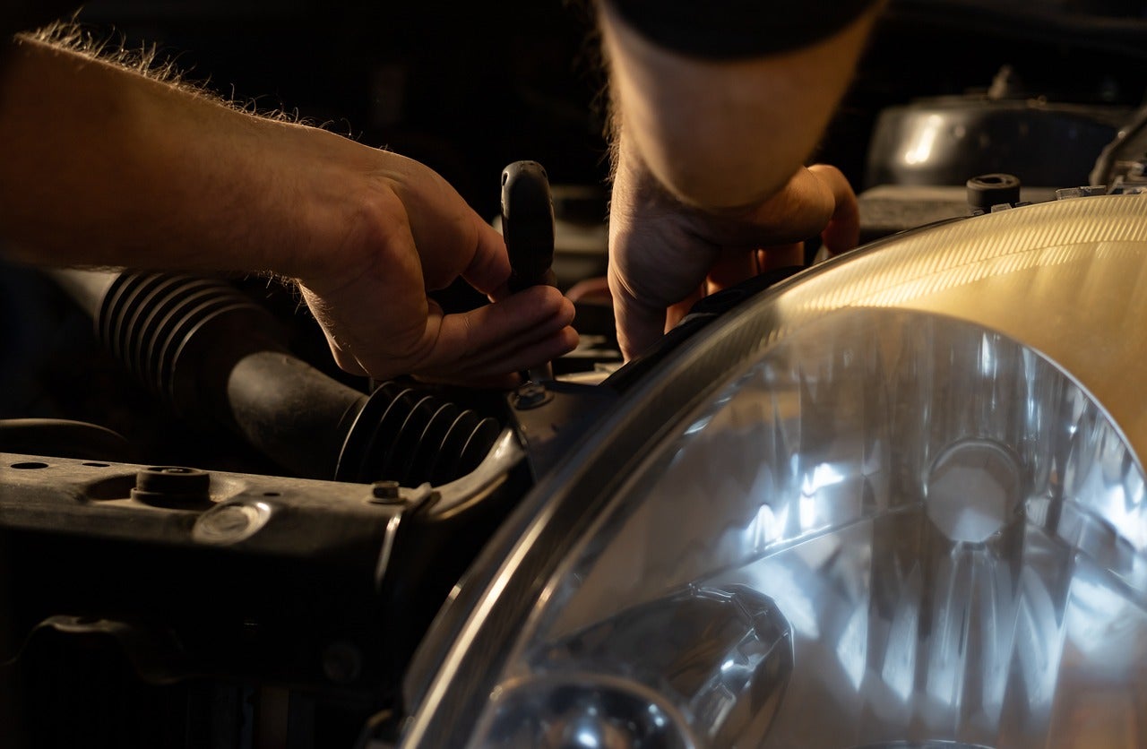 A car being repaired by a mechanic