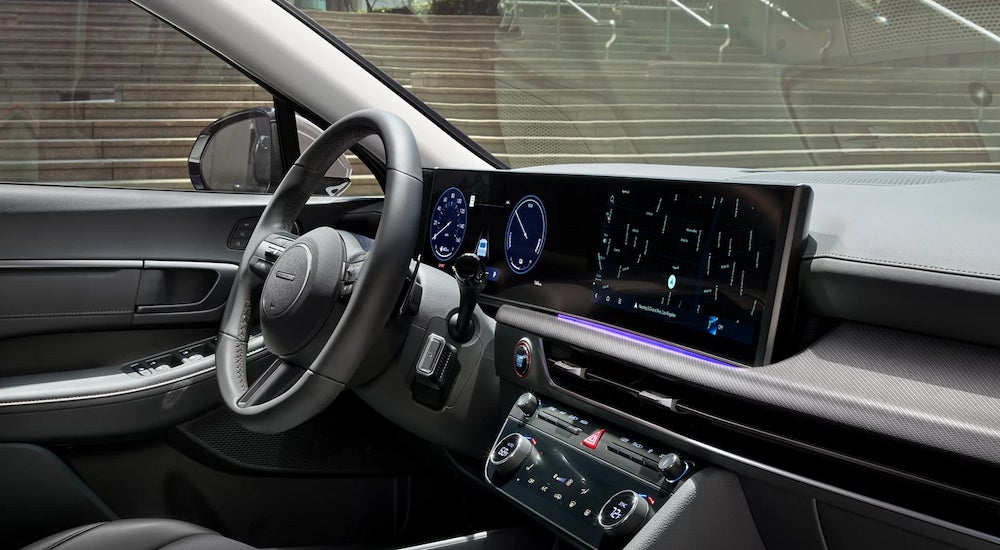 The curved infotainment screen in a 2024 Hyundai Sonata Limited Hybrid for sale. 