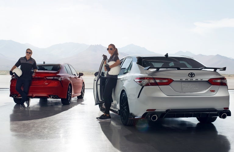 People delivering Toyota Camry models
