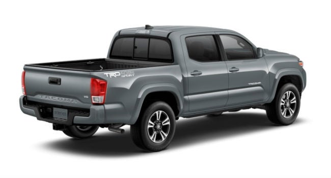 A rear right quarter view of a Cement 2018 Tacoma