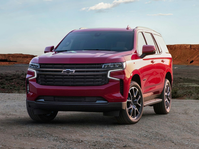 A red Chevrolet Tahoe parked outdoors