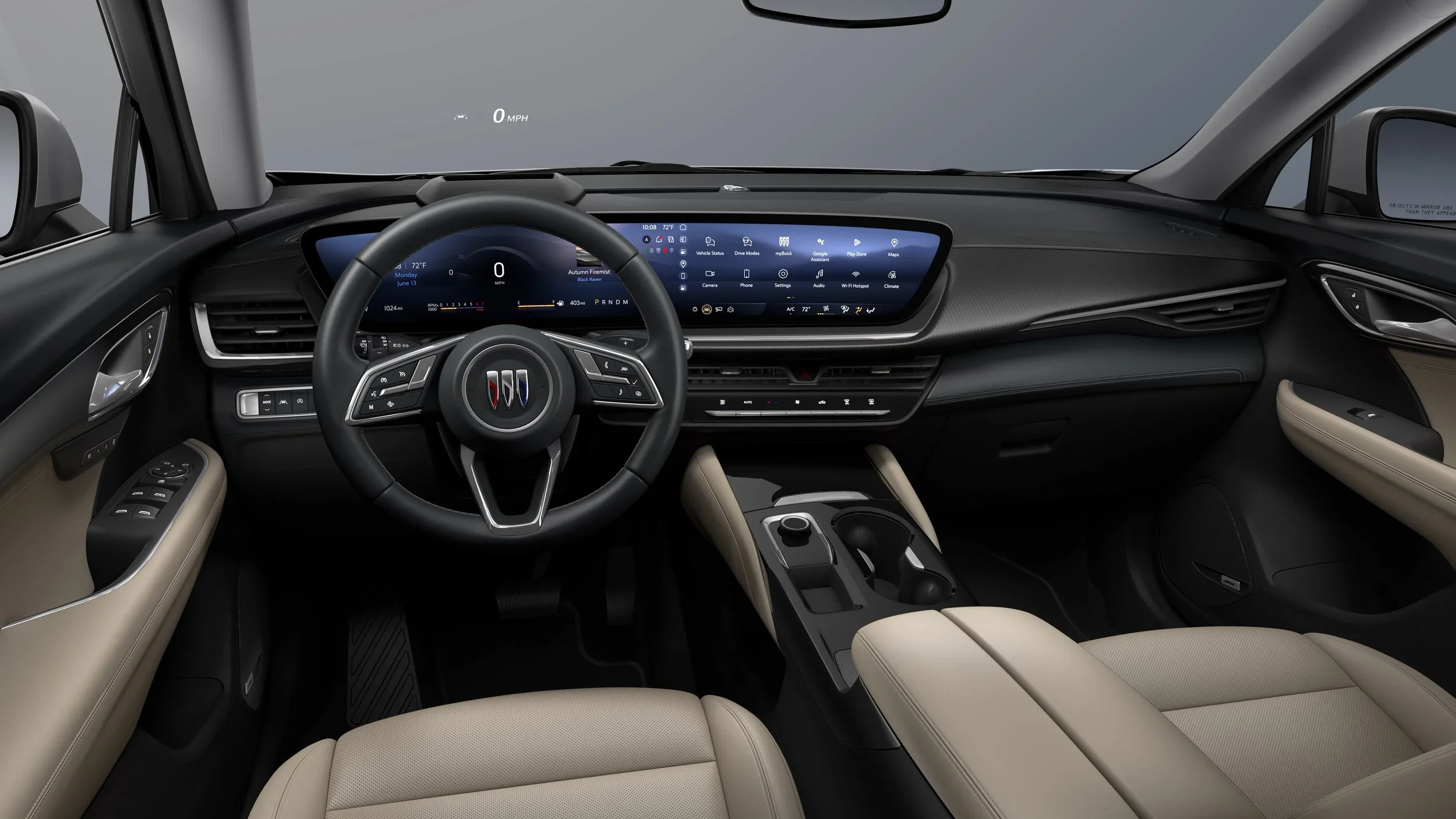 Buick Envision interior with black dashboard, tan leather seats and wide touchscreen