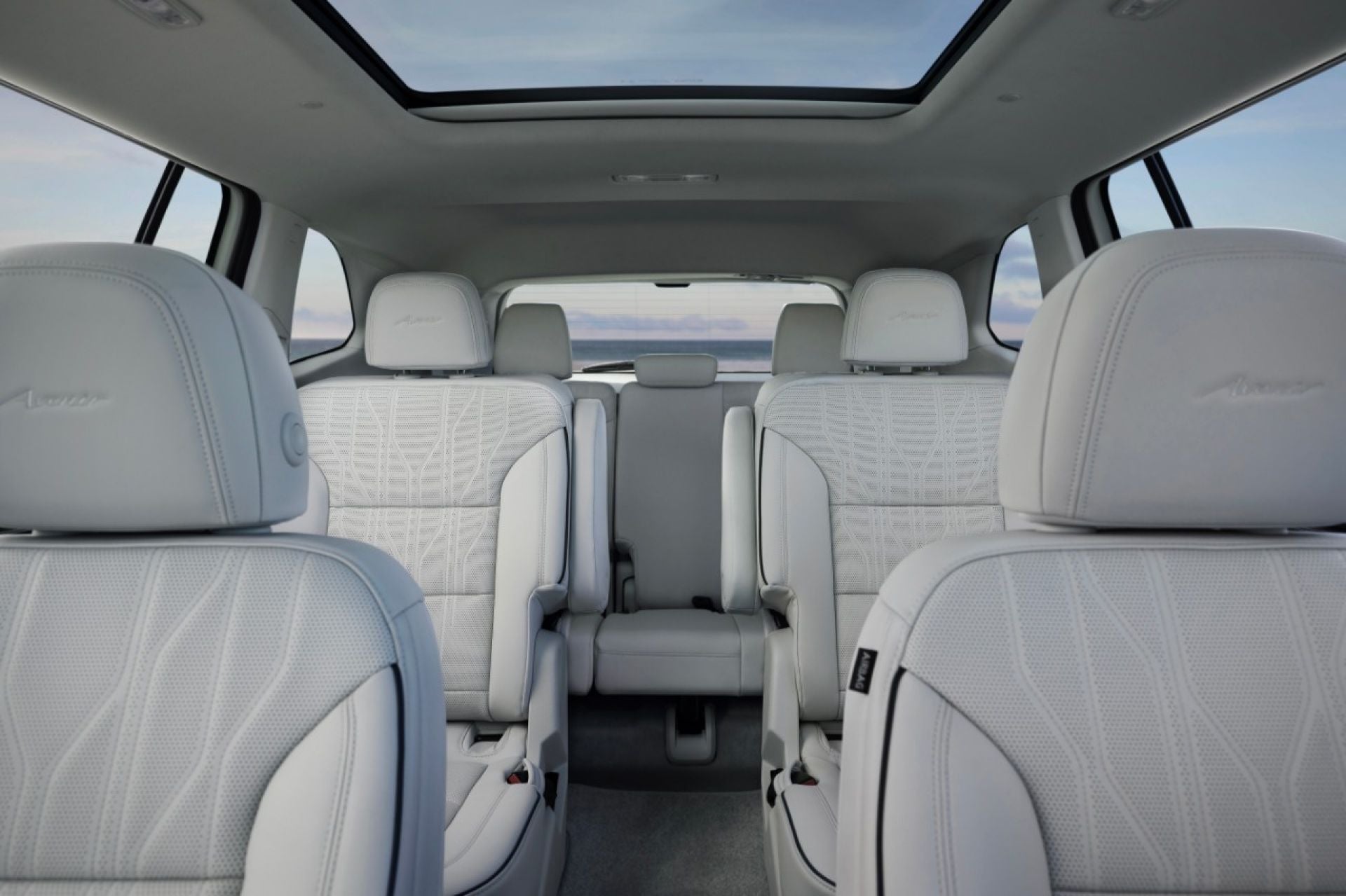 Buick Enclave Avenir second and third row seating in white leather