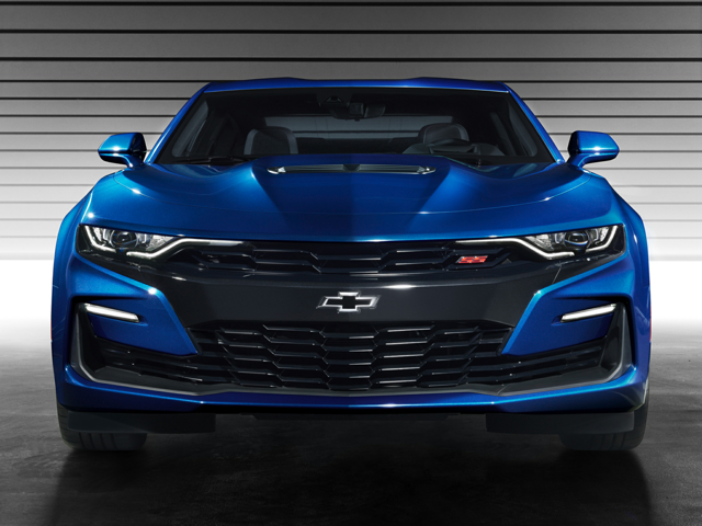 A head-on picture of a dark blue metallic Chevy Camaro, looking powerful and aggressive. 