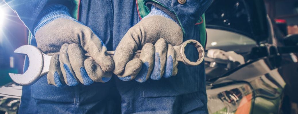 Mechanic holding a tool