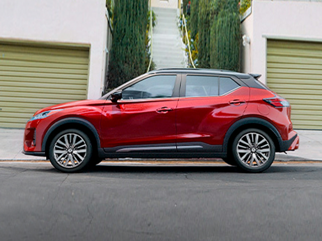 Profile view of a red 2024 Nissan Kicks | Nissan Kicks in Norfolk, VA | Banister Nissan of Norfolk