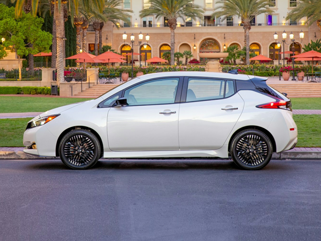 Profile view of a parked, white 2024 Nissan Leaf | Nissan Leaf in Norfolk, VA | Banister Nissan of Norfolk