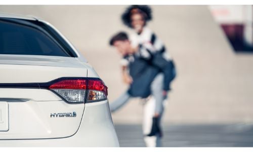 2020 Toyota Corolla white corner of taillight with people in background