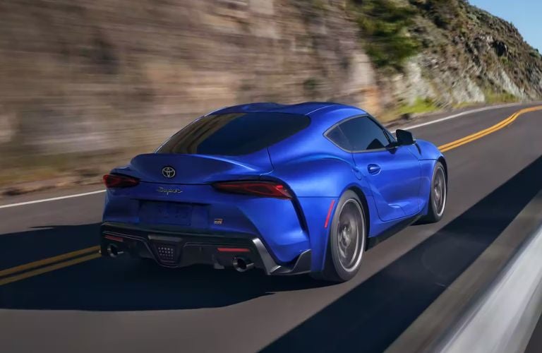 2023 GR Supra Blue on the road