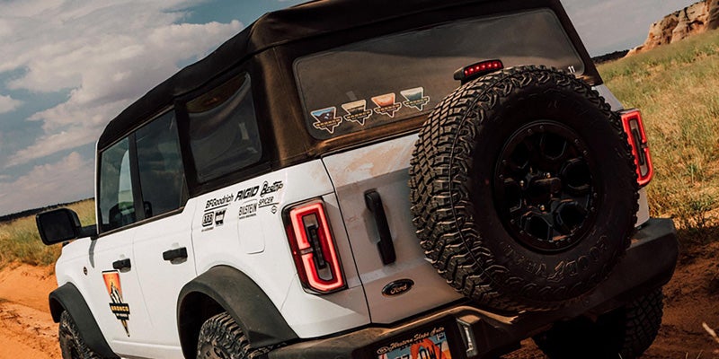 2026 White Ford Bronco doing off-road.