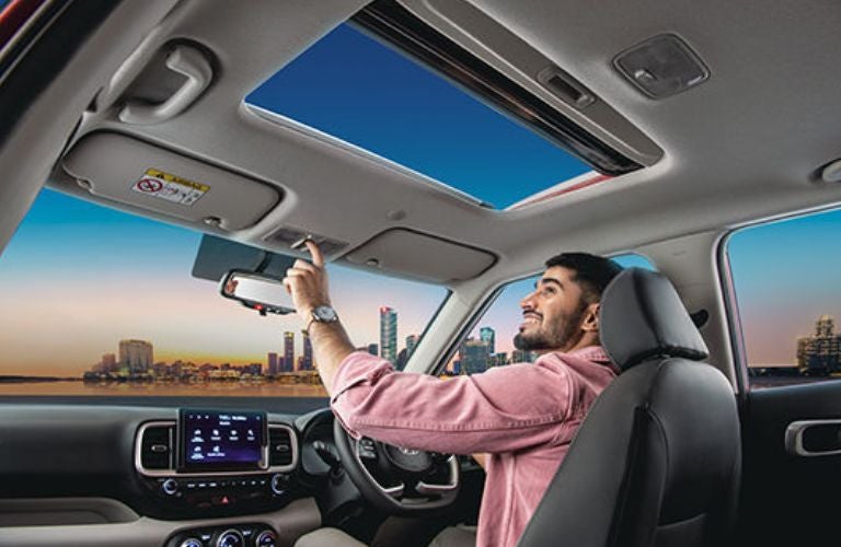 One man is sitting in the 2023 Toyota Venza.