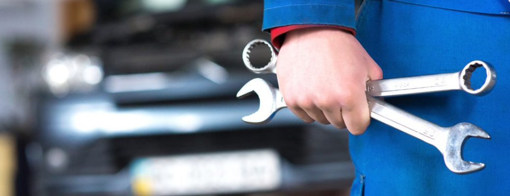 Technician with a tool