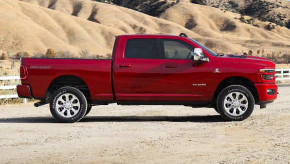 2026 Ram 2500 parked beside rolling hills