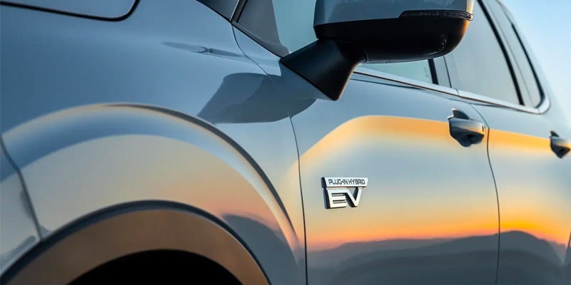 The badge on the 2024 Mitsubishi Outlander Plug-In Hybrid in San Jose, Ca