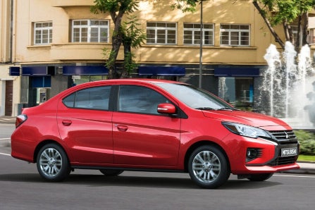 Red 2024 Mitsubishi Mirage G4 Sedan Parked on Street