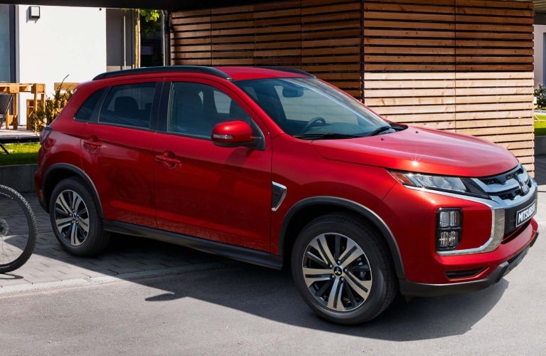 Red 2023 Mitsubishi Outlander Sport Parked