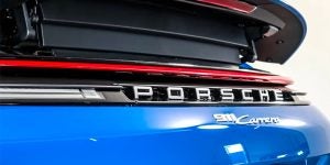 Rear view of a 2025 Porsche 911 Carrera. 