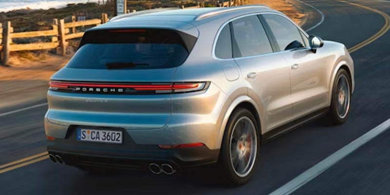 2026 Porsche Cayenne in it's back profile cruising on Highway