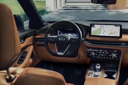 Tan and Black Interior Driver Side View on 2024 INIFINITI QX60