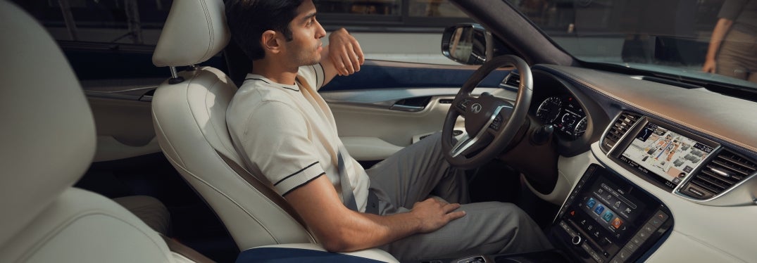 Man Driving Inside 2024 INFINITI QX50