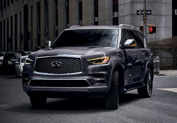 A 2024 INFINITI QX80 taking a turn near Redwood City, CA 