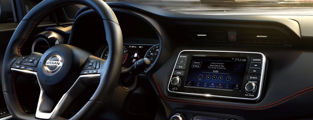 Steering wheel and Dashboard view of a Nissan