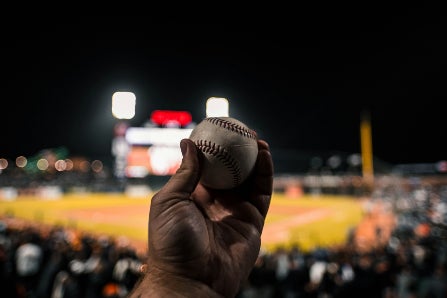 Hand Holding Baseball