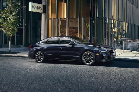 Side profile of 2023 Hyundai Sonata parked on street
