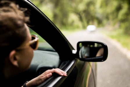 Driving on Road with Head out Window