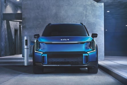 Kia EV Plugged In at Charger