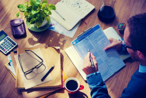 An experienced injury attorney in Dyer, IN discussing a personal injury case with a client, highlighting how an attorney can help when dealing with insurance companies after an injury.