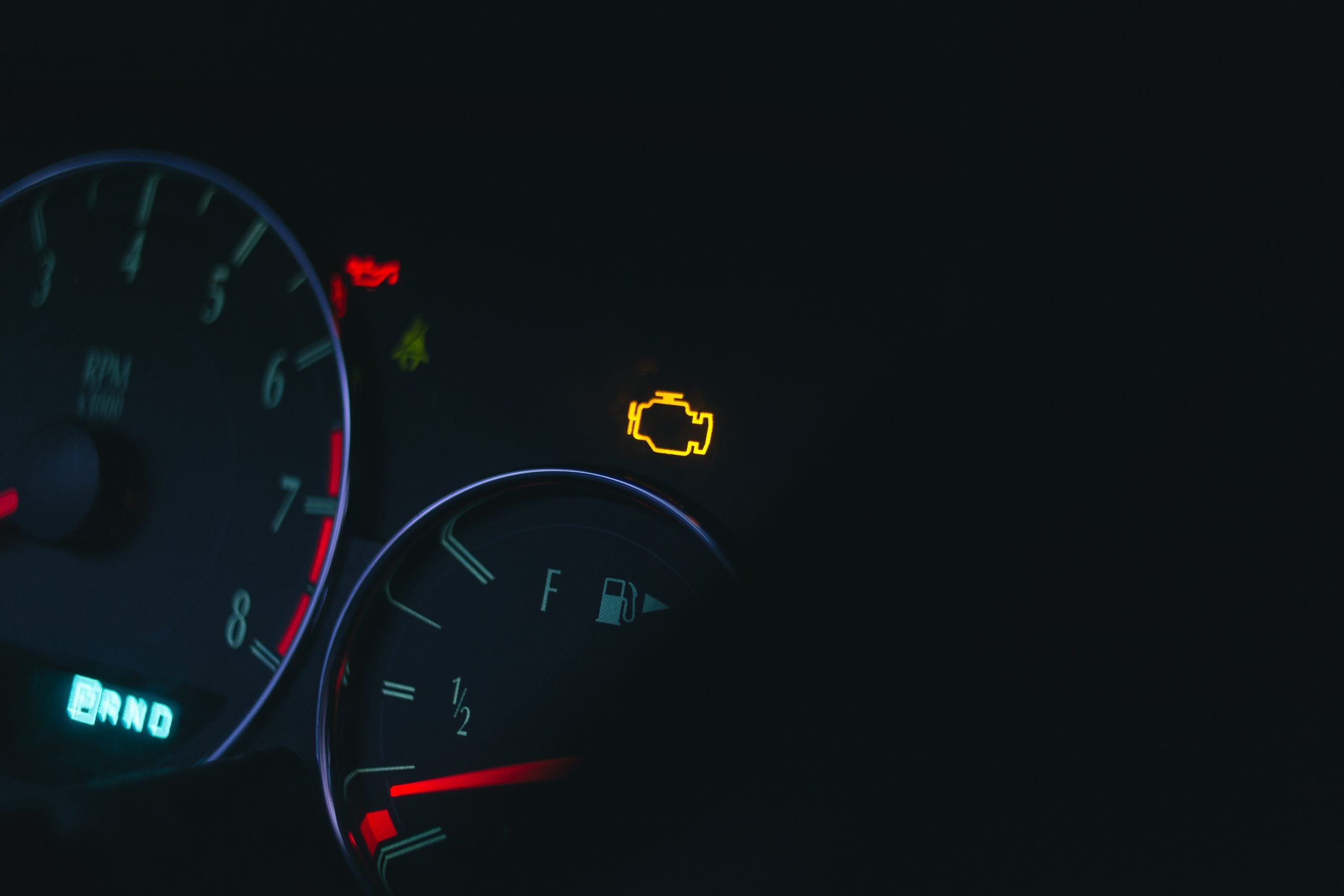 Car,Dashboard,With,Check,Engine,Light,On