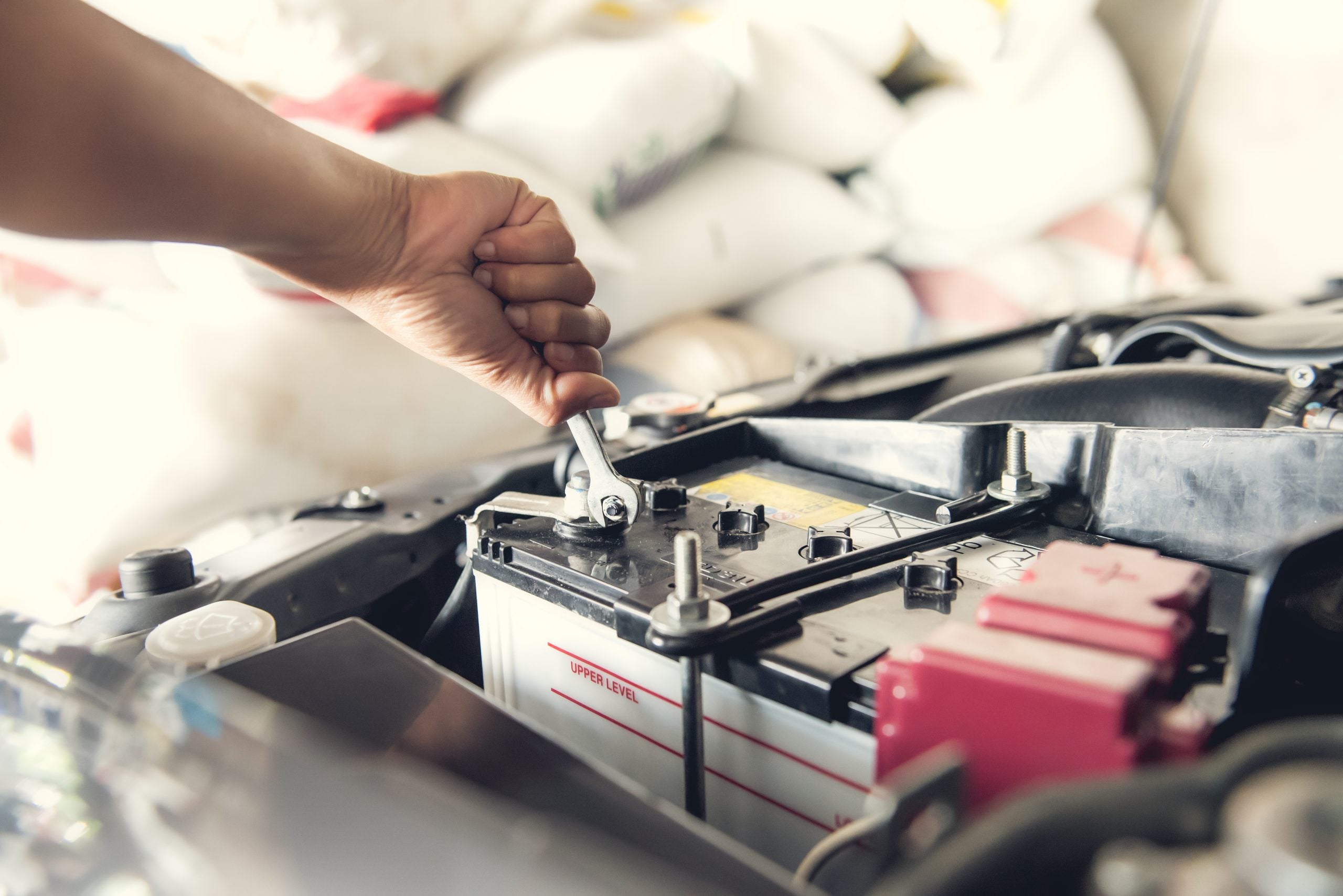 Car,Service,,fitting,A,Car,Battery,With,Wrench