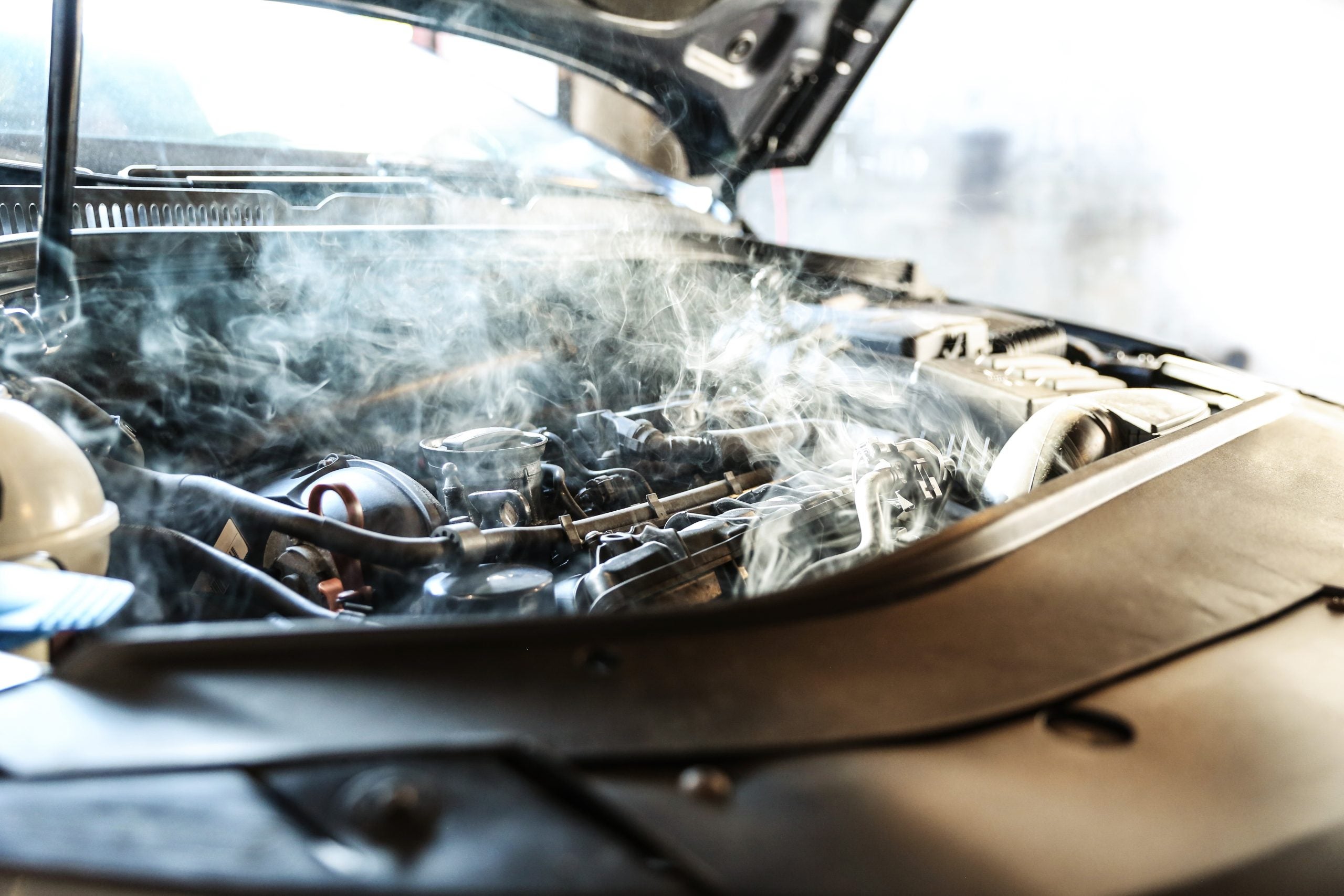Car,Engine,Overheating,Close,Up.,Vehicle,Engine,In,Smoke.,Short