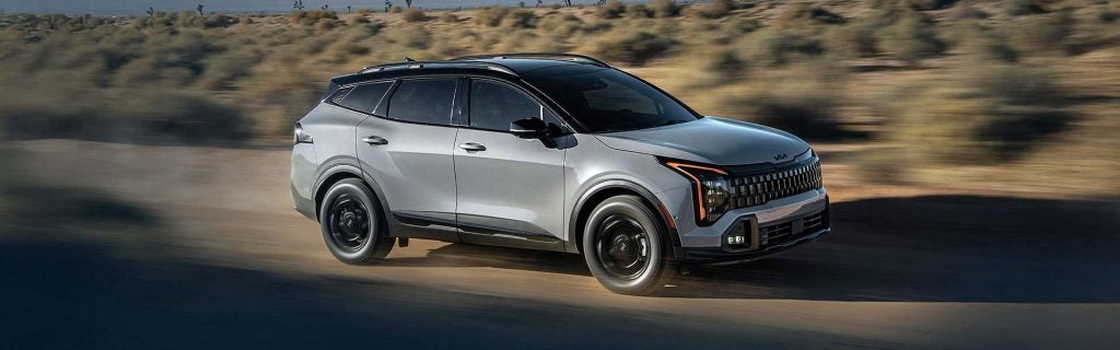 2026 Kia Sportage Running on road
