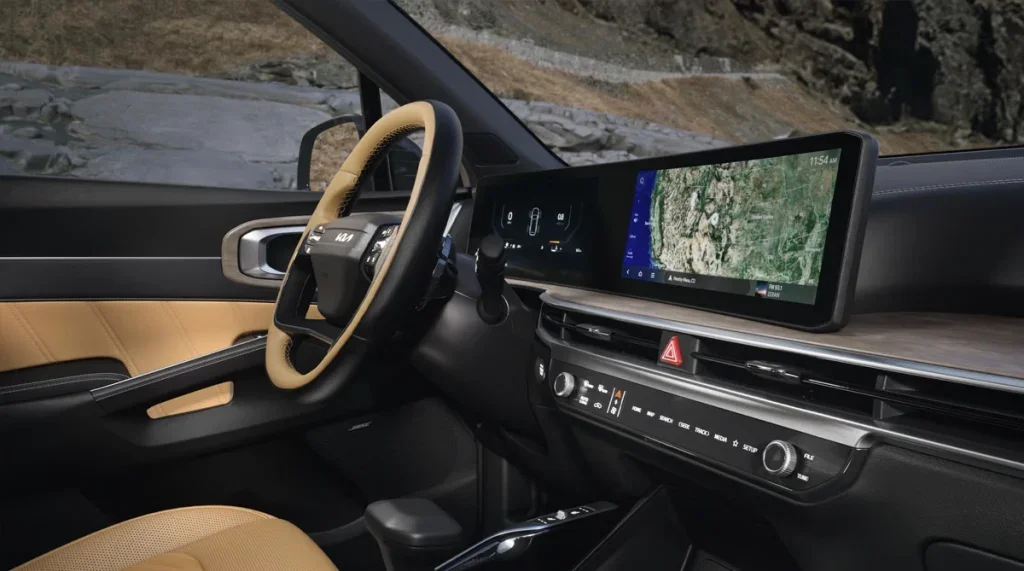 2026 Kia Sorento front cabin with dashboard display and tan interior materials