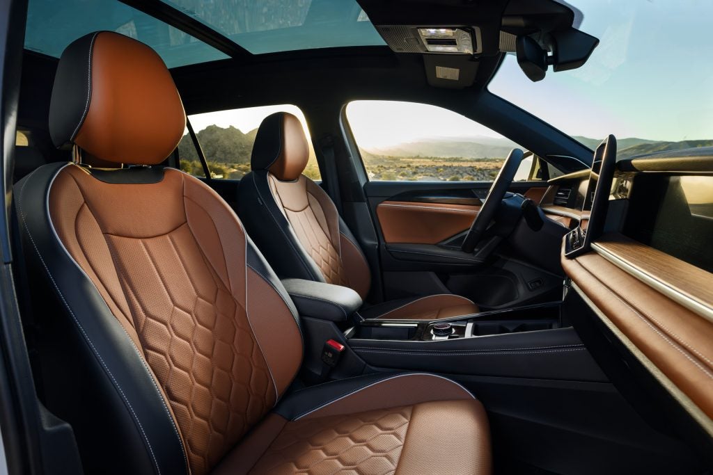 Interior view of the 2025 Volkswagen Tiguan showing premium seating, dashboard design, and front cabin layout
